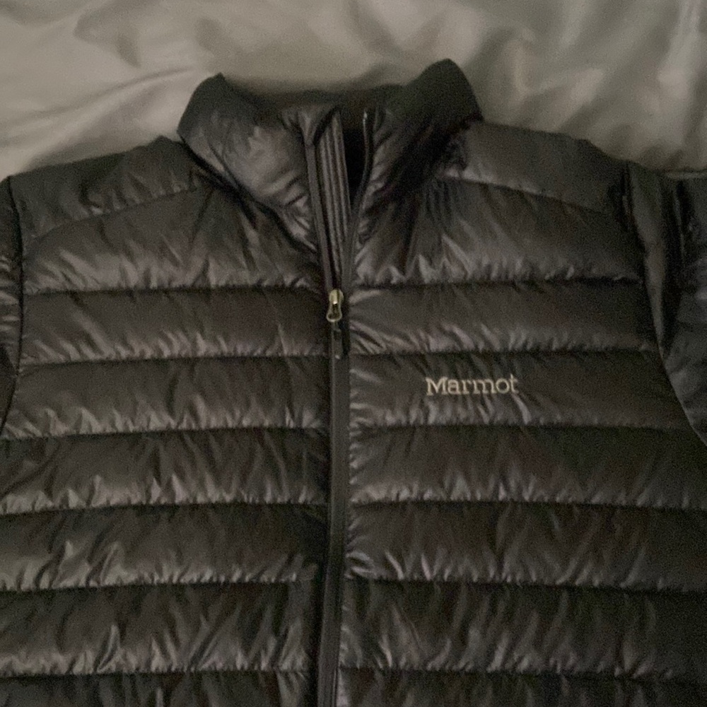 Brand new! Marmot jacket! 700 fill. Size LG Great for the incoming winter season